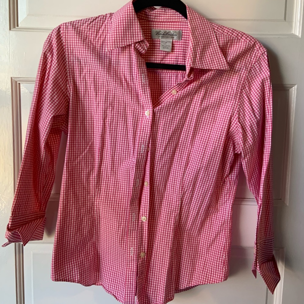 Button down blouse with cuffs.